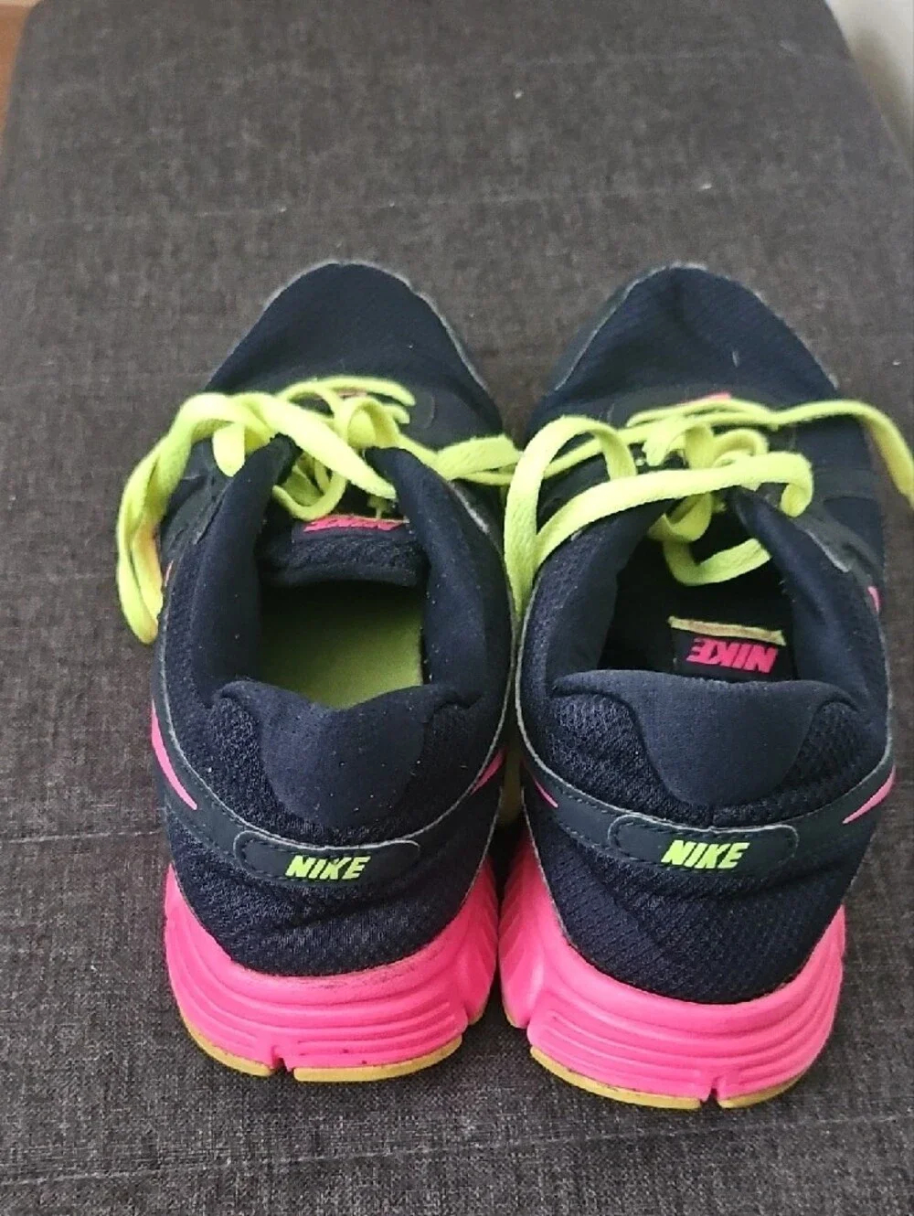Nike Black Sneakers with Pink Swoosh and Neon Yellow Laces